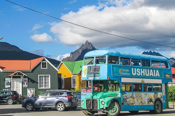 Exploring Ushuaia: Double Decker Bus Tour - Getting on board: Civic Plaza meeting point and the top-deck reality