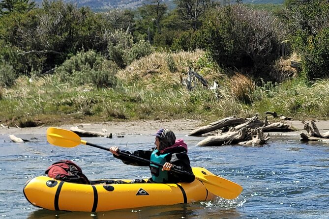 Packrafting experience along the Olivia River - The river stop at the Laguna Esmeralda confluence for lunch