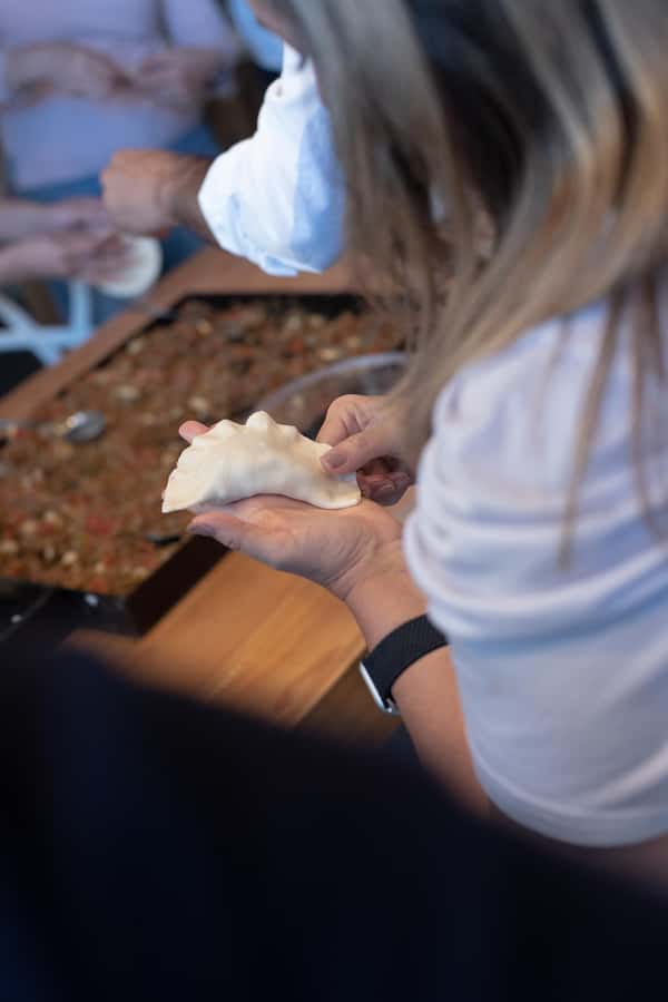 Premium Empanadas Cooking Class & Wine Tasting Experience - Entering the kitchen: what you do during the empanada lesson