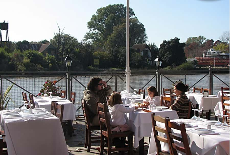 Tigre with Lunch overlooking the River and Navigation - The morning drive north, past stadiums and urban landmarks
