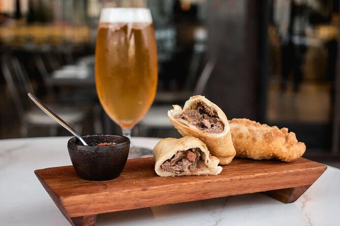 Traditional Argentine FoodTour with optional Michelin Experience - Wine, cheese, and charcuterie stops that set the tone