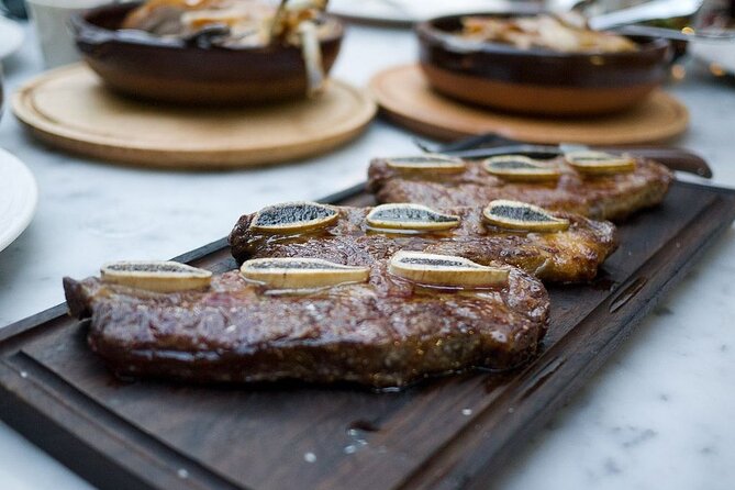 Traditional Argentine FoodTour with optional Michelin Experience - Empanadas and choripan, plus chimichurri on the side